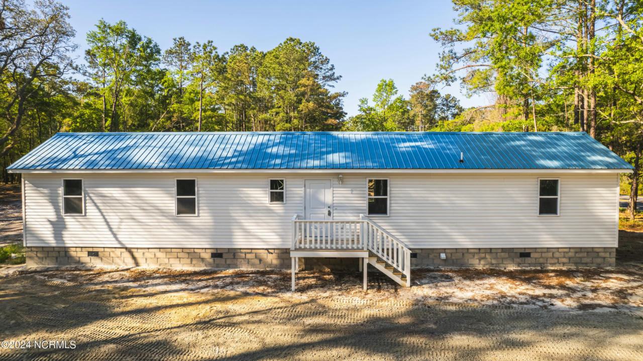2591 SHELL POINT RD SW, SHALLOTTE, NC 28470, photo 1 of 25